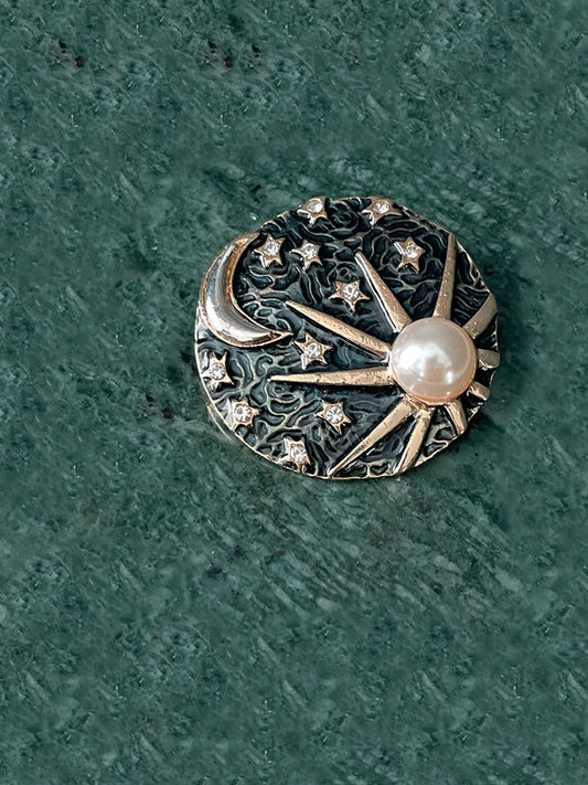 Kosmos brooch