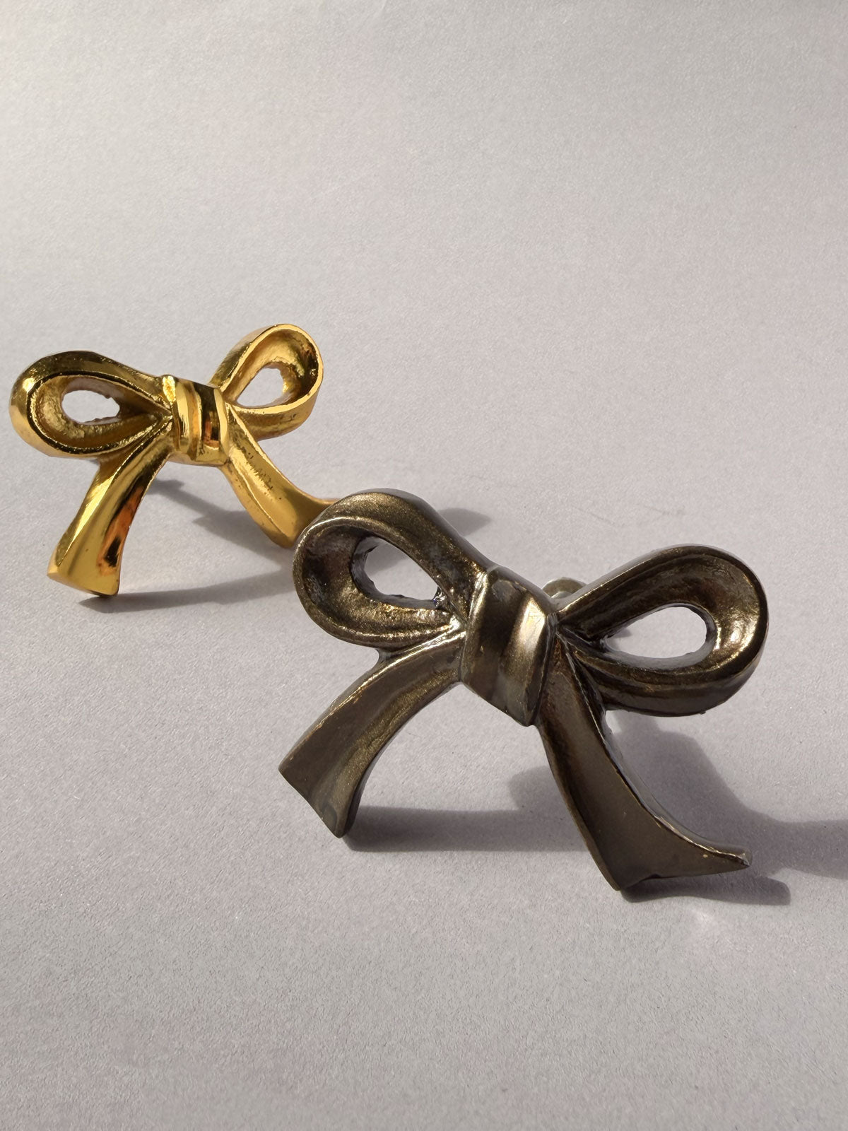 Cast iron knob bow aged brass