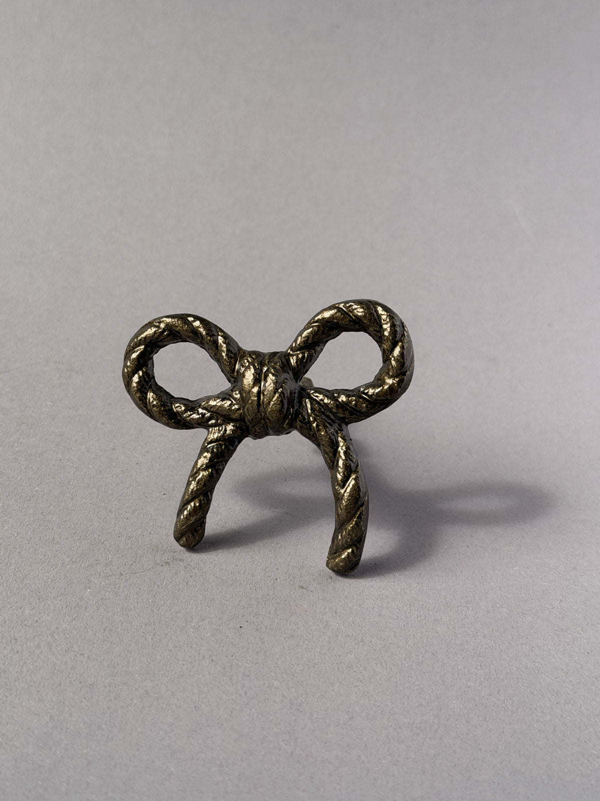 Cast iron knob rope bow antique
