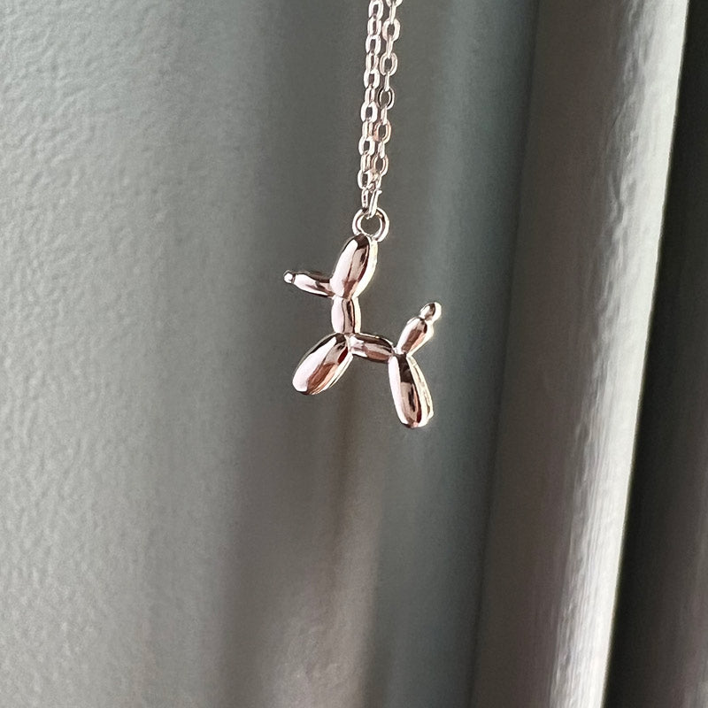 silver poodle pendant