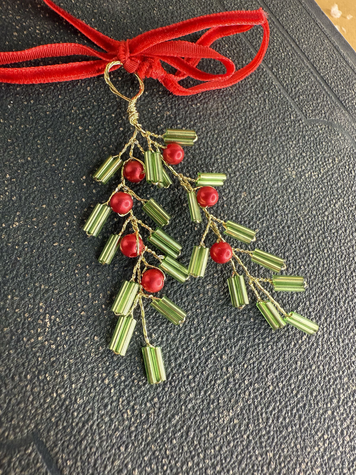 Beaded fir branch ornament