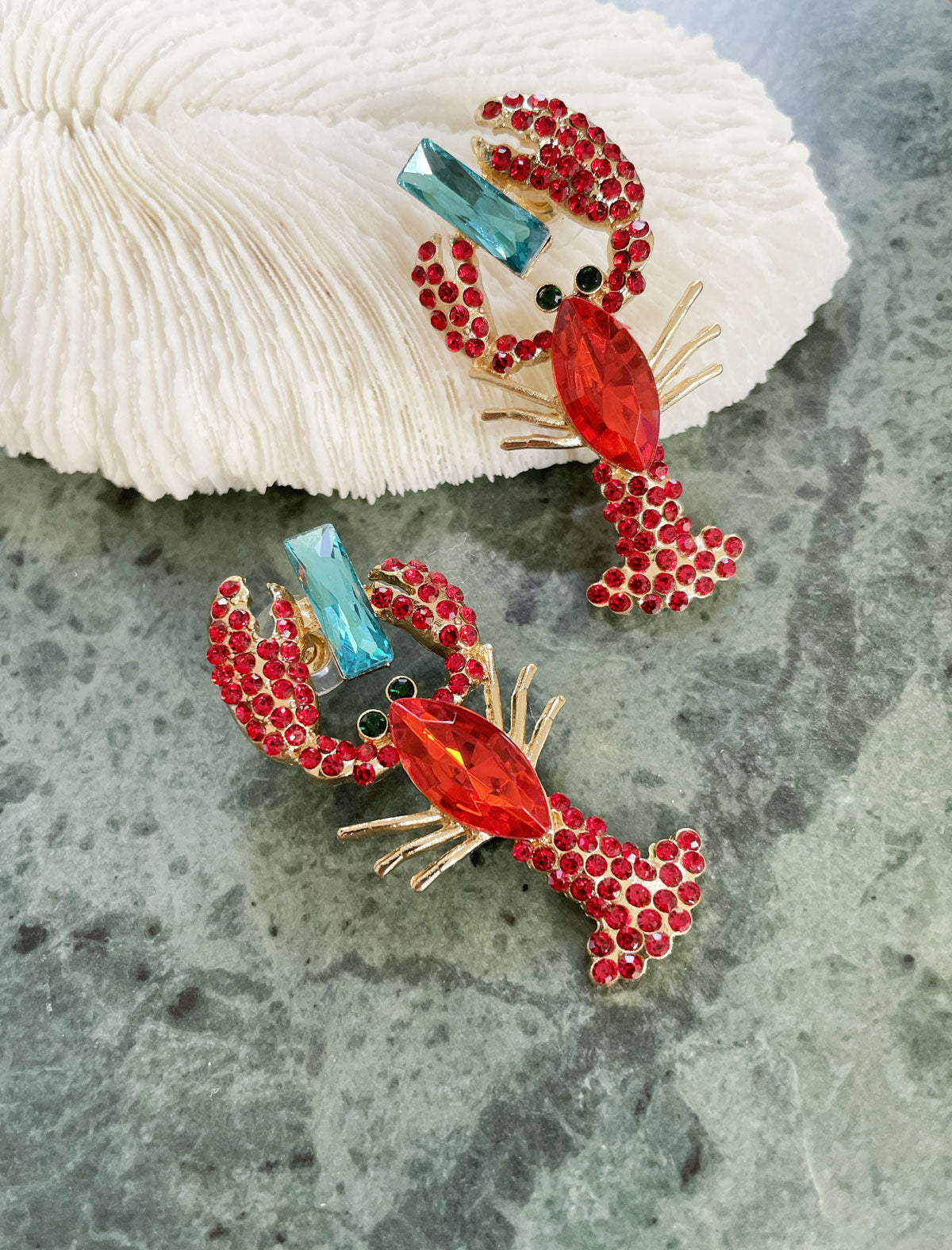 Crayfish earring blue stone