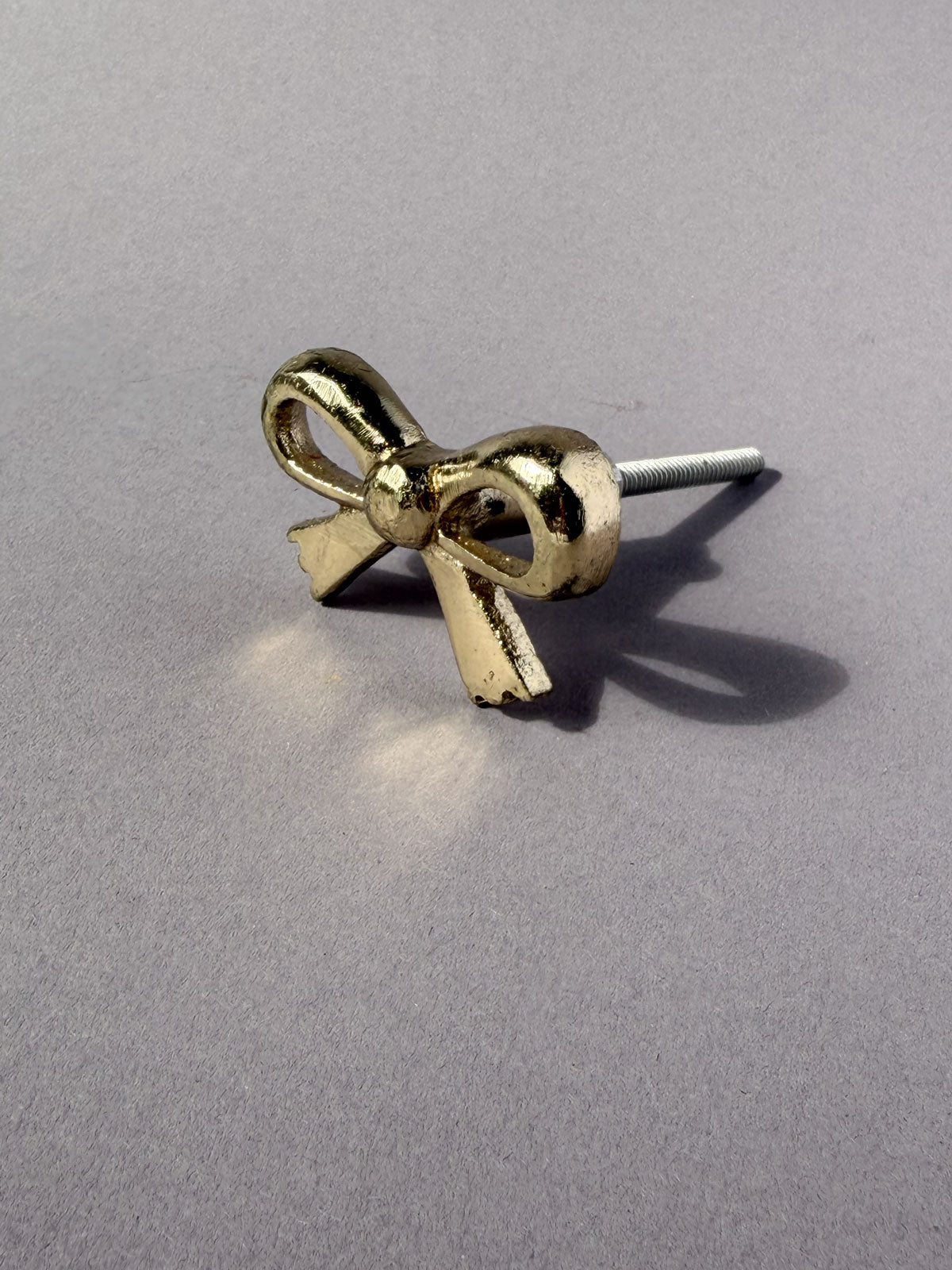 Cast iron knob small bow gold