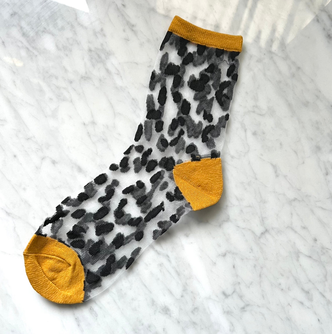 Jacquard Mesh Socks
Leo Black