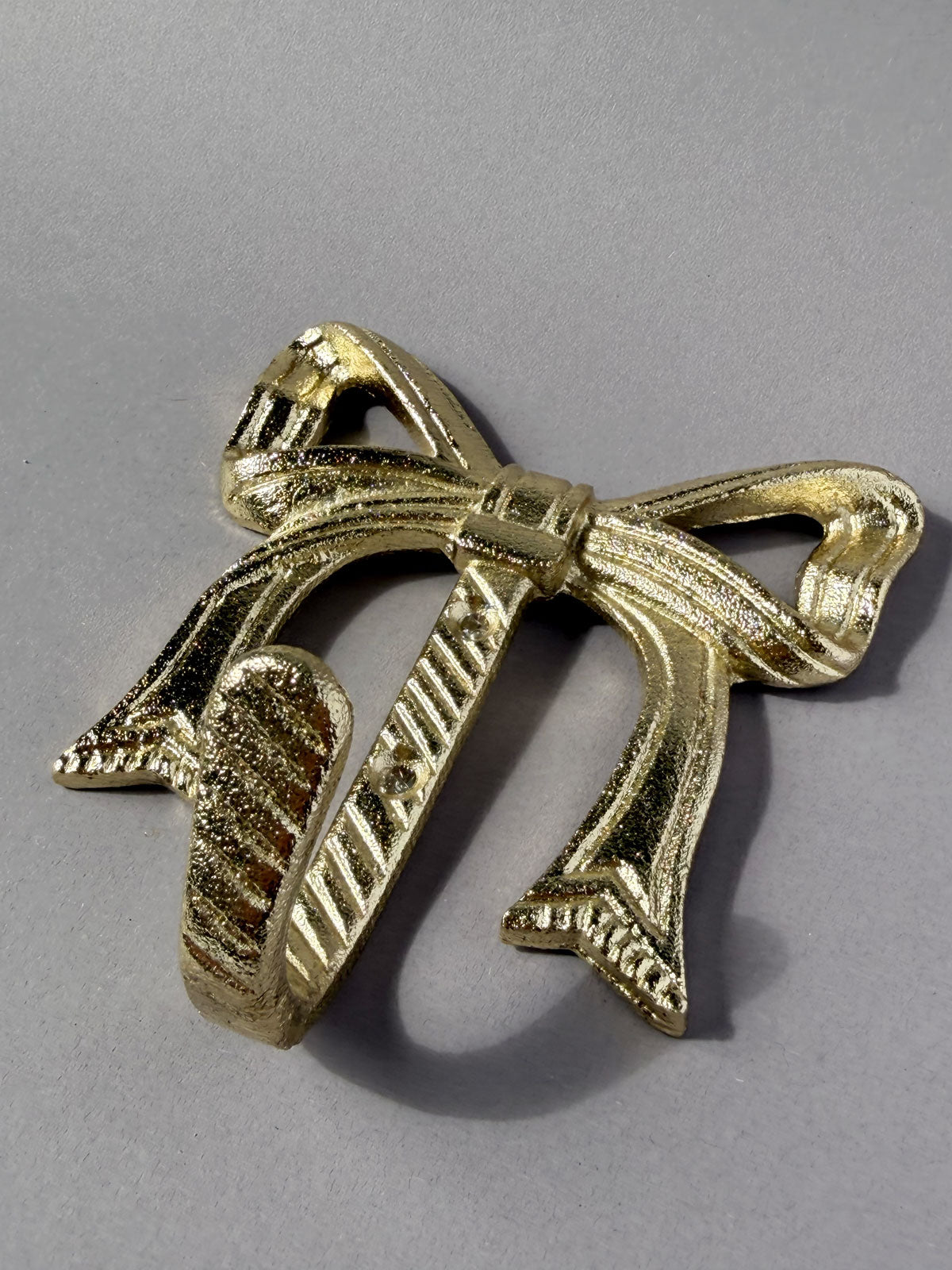 Wall hook Bow gold