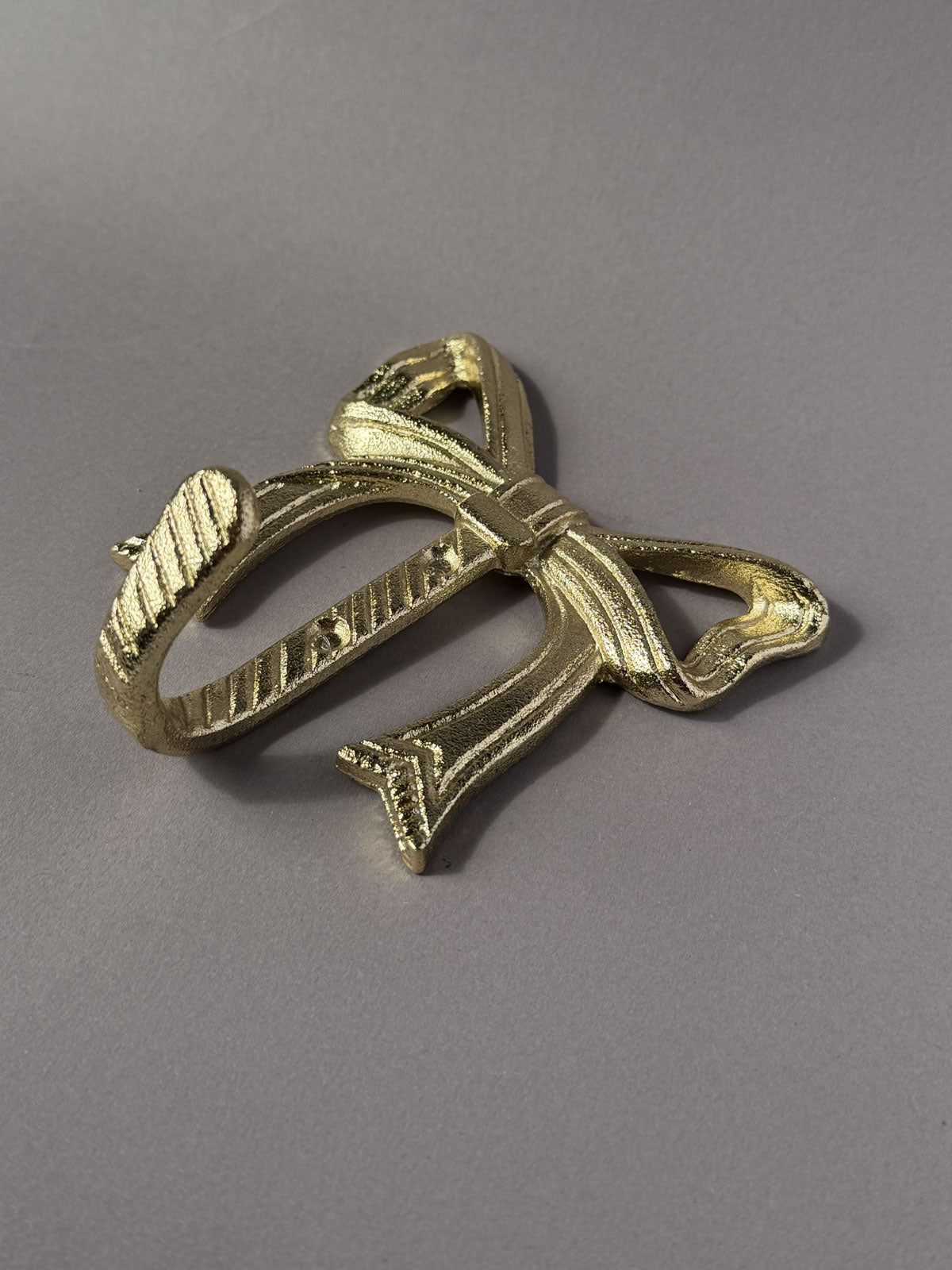 Wall hook Bow gold