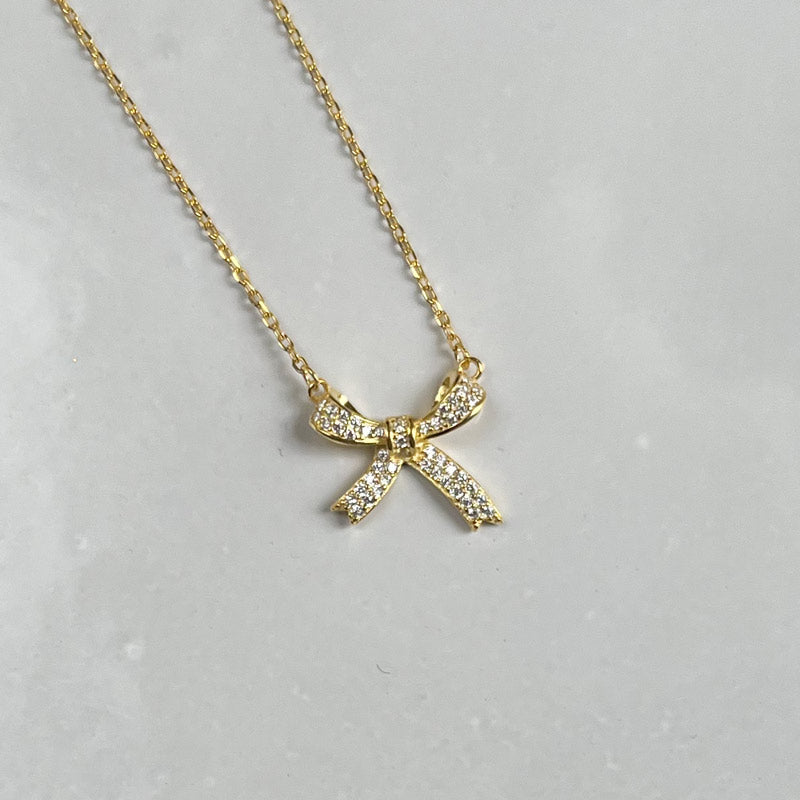 Sparkling bow necklace