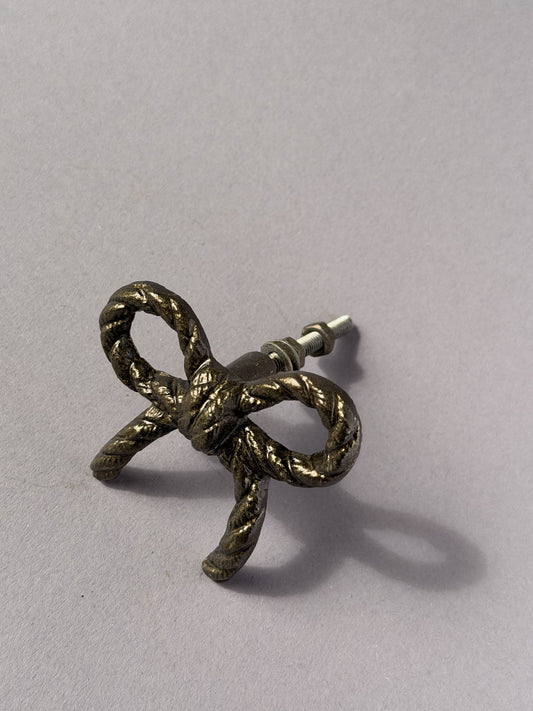 Cast iron knob rope bow antique